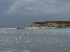 Low-angle light across St. Thomas Bay, at the south end of Malta.
